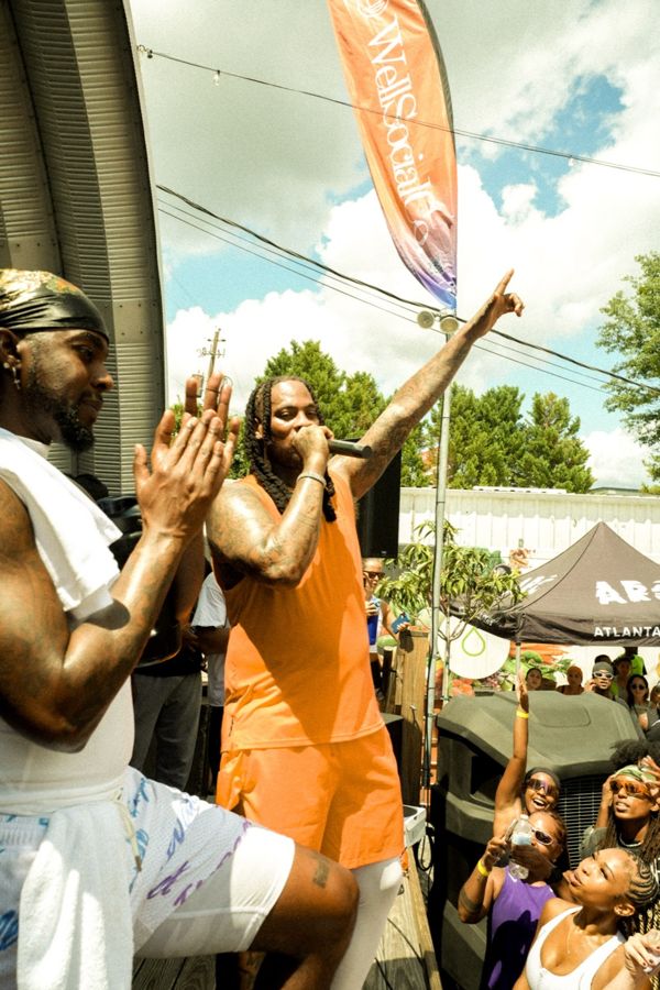 Waka Flocka facing the crowd from the stage in Atlanta